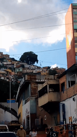 Street-level look at a Caracas hillside neighborhood and surroundings