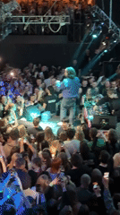 Live music performance draws crowd at indoor venue