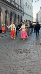 Cultural dancers perform in Riga's historic district