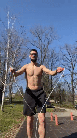 Man exercises with jump rope on Shumen walkway