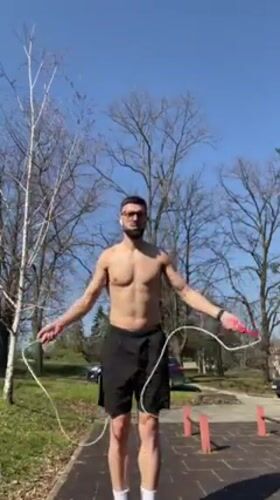 Man exercises with jump rope on Shumen walkway
