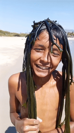 Family beach day captured in Juan Griego, Venezuela