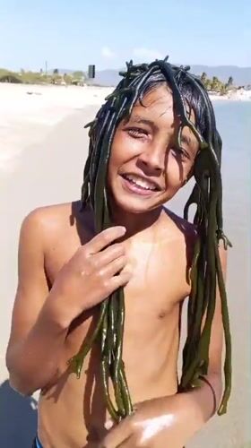 Family beach day captured in Juan Griego, Venezuela