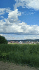 Rural drive captured scenic countryside views under blue skies