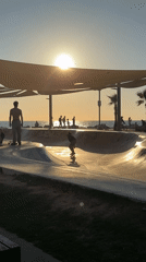 Tel-Aviv coastal skatepark bustling during sunset hours