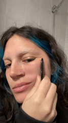 Woman documents morning skincare routine with gua sha in Gijón