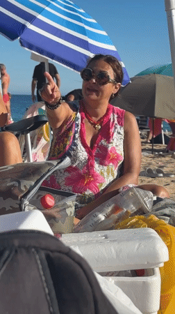 Acoustic guitar session on a sunny Barbate beach