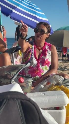 Acoustic guitar session on a sunny Barbate beach