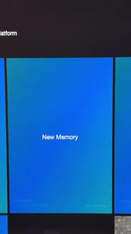 The video displays a screen recording of a digital interface, likely a platform dashboard, against a black background. At the top left, the text "activities in the platform" is partially visible. The interface features large, colorful rectangular panels, or "tiles," arranged horizontally.

The camera pans from left to right, revealing several of these tiles. The leftmost visible tile has a purple and pink gradient background. Initially, it shows "pATTN" and "Staked $112.4 USD." As the pan continues, more details become visible on this tile: "Staked," "+10000.00 pATTN," and the date "4/21/2026, 04:34 PM." Behind this text, a faint, stylized image of a person, possibly wearing a hat, is discernible, set against what appears to be an outdoor or desert-like scene.

To the right of this, two blue gradient tiles are visible. Both are labeled "New Memory" in white text at their center. The bottom left of the first blue tile shows "FM-cYHVx2" and "4/21/2026, 04:34 PM," with "New Memory" repeated at the bottom right. The second blue tile also clearly states "New Memory."

The overall impression is of a user interacting with an application that tracks or displays digital activities, possibly related to cryptocurrency staking or memory journaling, given the visible dates and "Staked" information. The visible date indicates a future context. Background music is audible throughout the recording.