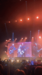 Live concert in Saint Petersburg with vivid stage lighting and screens