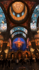Museum visitors document religious and historical exhibits
