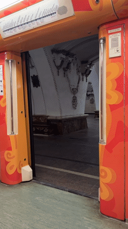 Ornately decorated subway train spotted at station platform