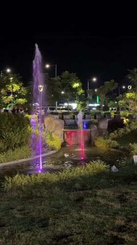 Evening gathering at illuminated park in Davao City draws visitors