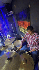 Live band performance at an indoor venue in Nkpor, Nigeria