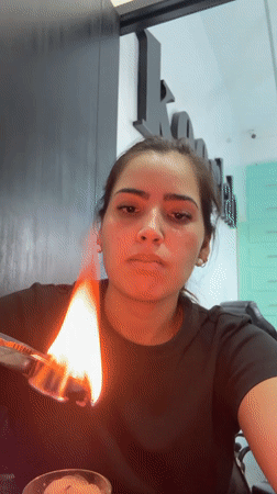 Woman conducts heated craftwork process in Mexican town