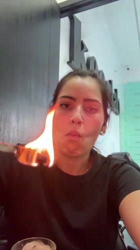 Woman conducts heated craftwork process in Mexican town