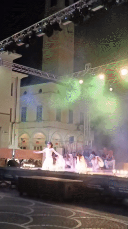 Dance performance lights up Viadana's town square on a summer night