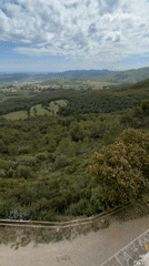 Visitors document scenic views from Torrelles de Foix observation platform