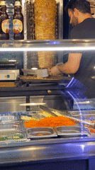 Food worker prepares doner kebab in Saint Petersburg restaurant