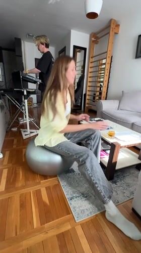 Woman exercises with ball in Belgrade suburb workout session