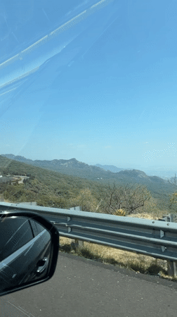 Driver captures sunny mountain drive through Coajomulco, Mexico