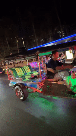 Modified tuk-tuk with LED lighting spotted operating in Bangkok