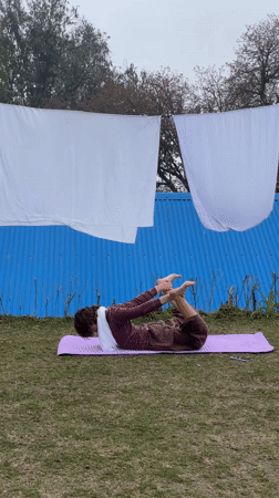 Morning activities unfold in foggy Nepal mountain village