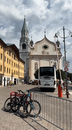 Cortina d'Ampezzo street life with Olympic rings on display