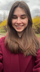 Woman photographed amid spring blooms in Saint Petersburg