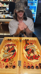 Man plays backgammon at Sochi establishment