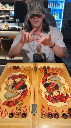 Man plays backgammon at Sochi establishment