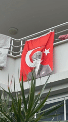 Turkish flag with Atatürk image spotted on balcony