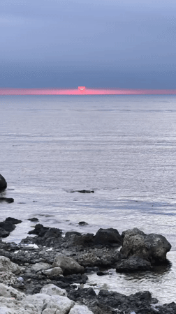 Witnesses document sunset scene along Sevastopol coastline