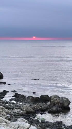 Witnesses document sunset scene along Sevastopol coastline