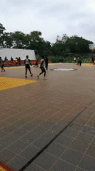 Afternoon basketball game on outdoor court in Lagos