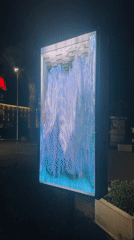 Digital waterfall animation displayed on LED screen in Budva