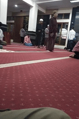 Evening prayers and street life around a Bandung mosque