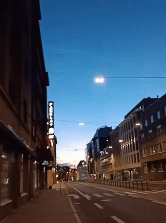 Tallinn streets at dusk, lights on, midsummer night