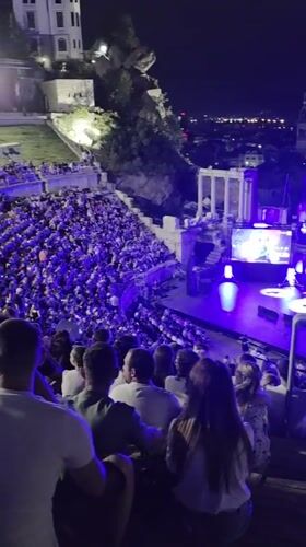Live show night at Plovdiv's outdoor amphitheater, beers in hand