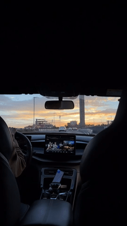 Highway drive through Yerevan, shot from the back seat