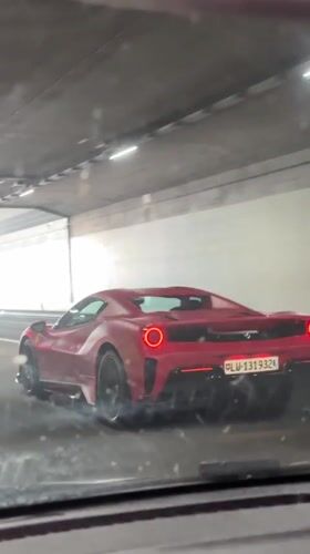 Red Ferrari spotted driving through tunnel in Glattbrugg