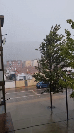 Intense hailstorm blankets Sant Joan Les Fonts streets and buildings