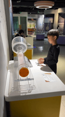 Science Museum Visitors Experience Interactive Exhibits in Jiangjin