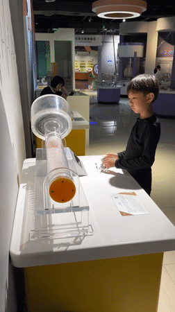 Science Museum Visitors Experience Interactive Exhibits in Jiangjin