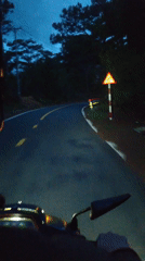 Motorcyclist records evening ride on winding Vietnam road
