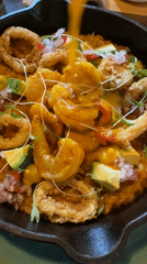 Diner documents seafood meal at San Isidro restaurant