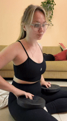Woman conducts home fitness session in Tel-Aviv apartment