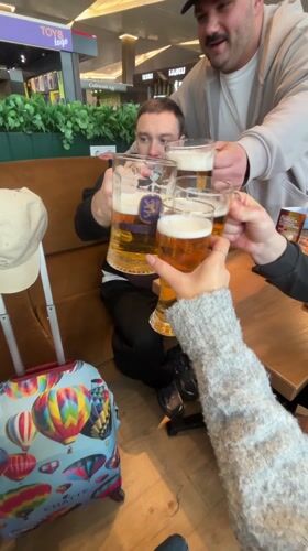 Travelers drink beer, read Tolstoy at Russian airport