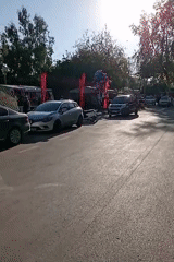 Outdoor art exhibition along Silifke's sunny riverfront