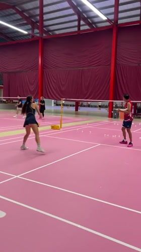 Badminton practice session recorded on pink court in Ko Samui